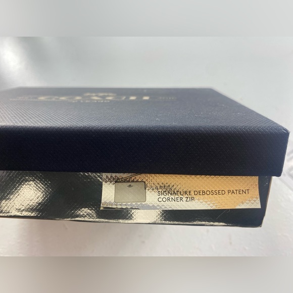 Boxed Signature Debossed Patent Corner Zip Wristlet - Picture 3 of 4